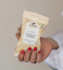 Foodin Raw  kešu oříšky v bílé čokoládě bio, 60 g
